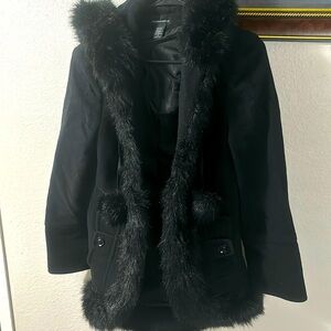 Black Hooded woman’s wool jacket, size M. Very very nicely taken care of.